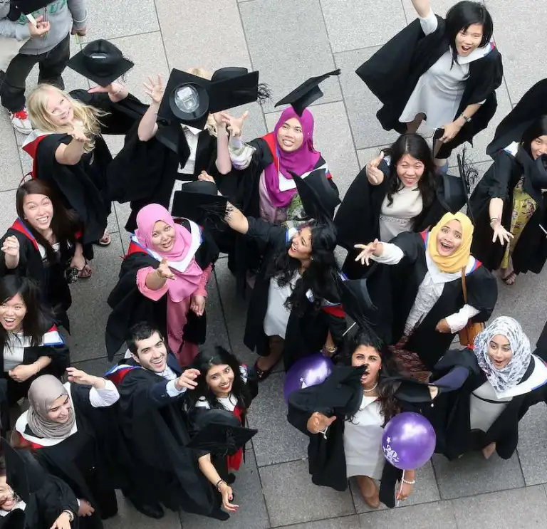 Students celebrating graduation